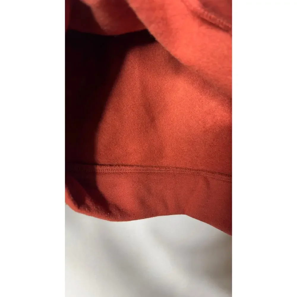 Alo Yoga Soleil Cropped Turtleneck Long Sleeve Top in a burnt orange sz S
